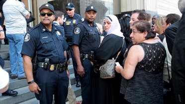 Family members of detainees line up to enter the federal court just before a hearing to consider a class-action lawsuit filed on behalf of Iraqi nationals facing deportation, in Detroit, Michigan, US, June 21, 2017. (Reuters)