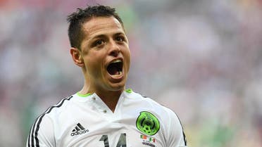 Mexico's forward Javier Hernandez celebrates after scoring a goal during the 2017 Confederations Cup group A football match between Portugal and Mexico at the Kazan Arena in Kazan on June 18, 2017. afp