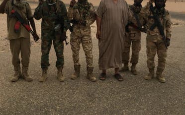 محمد باكير برفقة عدد من المرتزقة الماليين المنتمين لتنظيم القاعدة ببلاد المغرب أثناء محاولة هجومهم على بنغازي فى يوليو 2016
