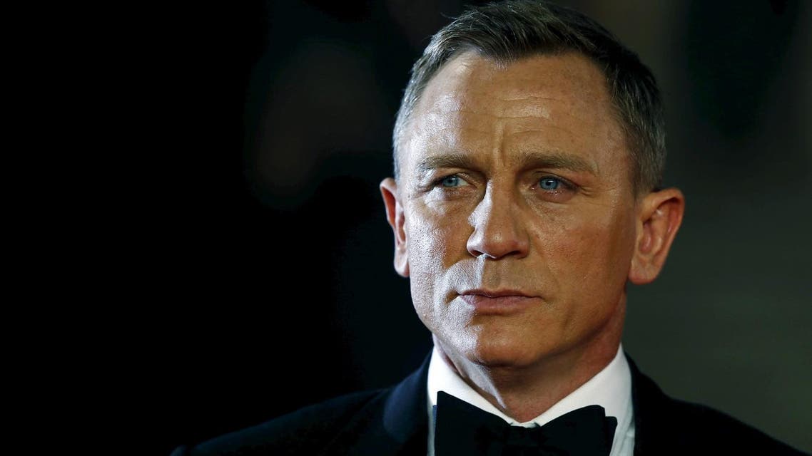 Daniel Craig poses for photographers as he attends the world premiere of the new James Bond 007 film "Spectre" at the Royal Albert Hall in London, Britain, October 26, 2015. (Reuters)