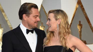 Actor Leonardo DiCaprio (L) and actress Kate Winslet arrive on the red carpet for the 88th Oscars on February 28, 2016 in Hollywood, California. (AFP)