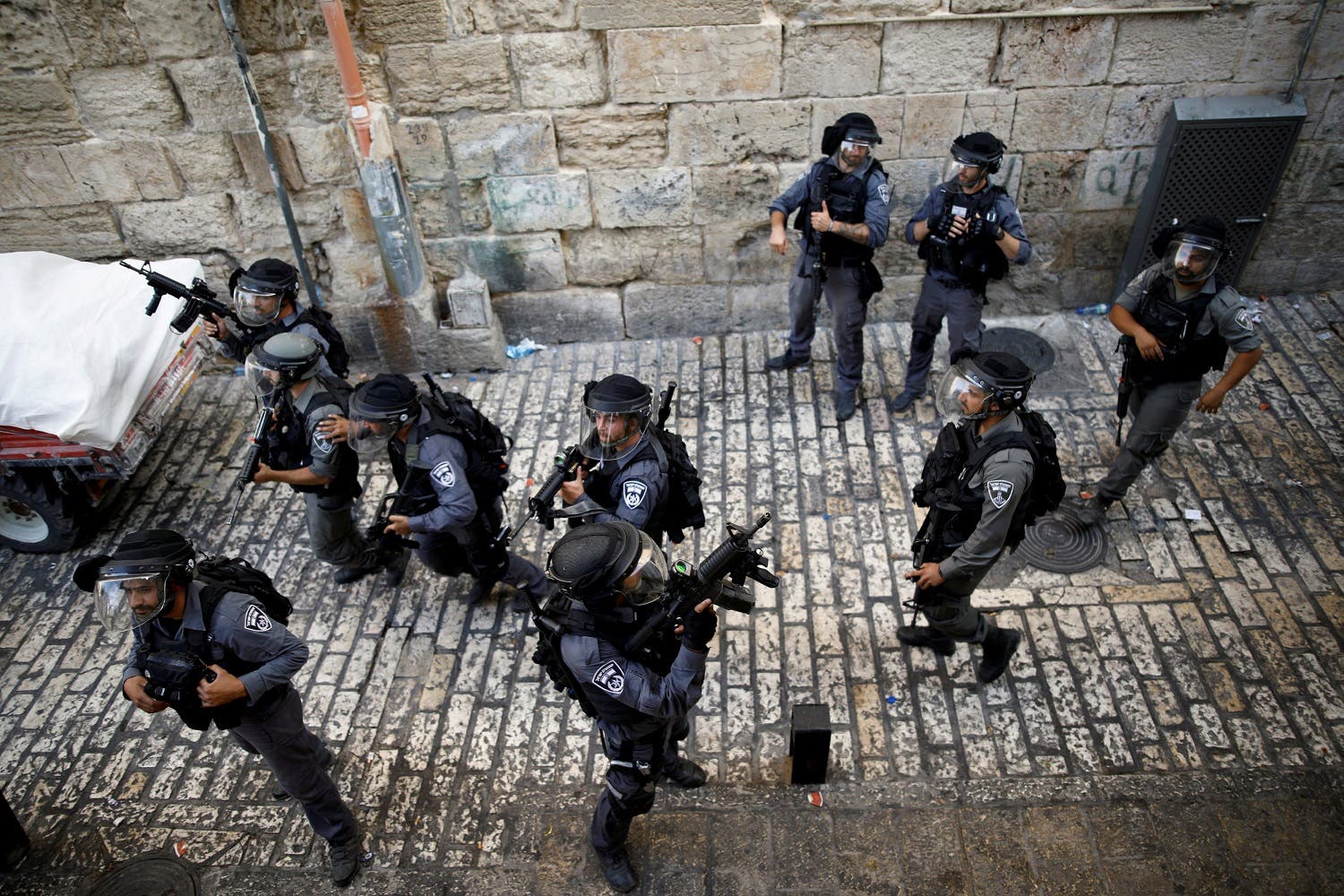 Israeli policemen guard a street at Jerusalem’s Old city outside the Noble Sanctuary compound, after Israel removed all security measures it had installed at the compound on July 27, 2017. (Reuters)
