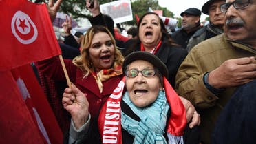 Tunisian women shout slogans against terror attacks and against allowing jihadists back into the country during a demonstration on Habib Bourguiba Avenue in Tunis on January 8, 2017. (afp)