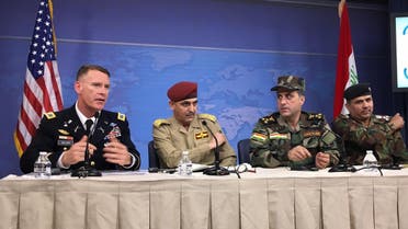 Colonel Ryan Dillon (L) speaks during a press conference at the Pentagon in Washington, DC on July 13, 2017. (AFP)