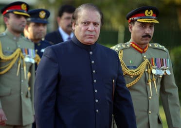 In this file photograph taken on June 5, 2013, Nawaz Sharif looks on after inspecting a guard of honor during a welcoming ceremony in Islamabad. (AFP)