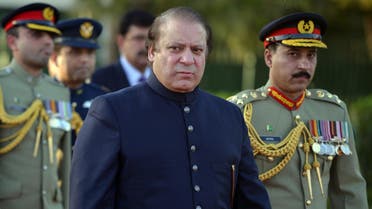In this file photograph taken on June 5, 2013, Nawaz Sharif looks on after inspecting a guard of honor during a welcoming ceremony in Islamabad. (AFP)