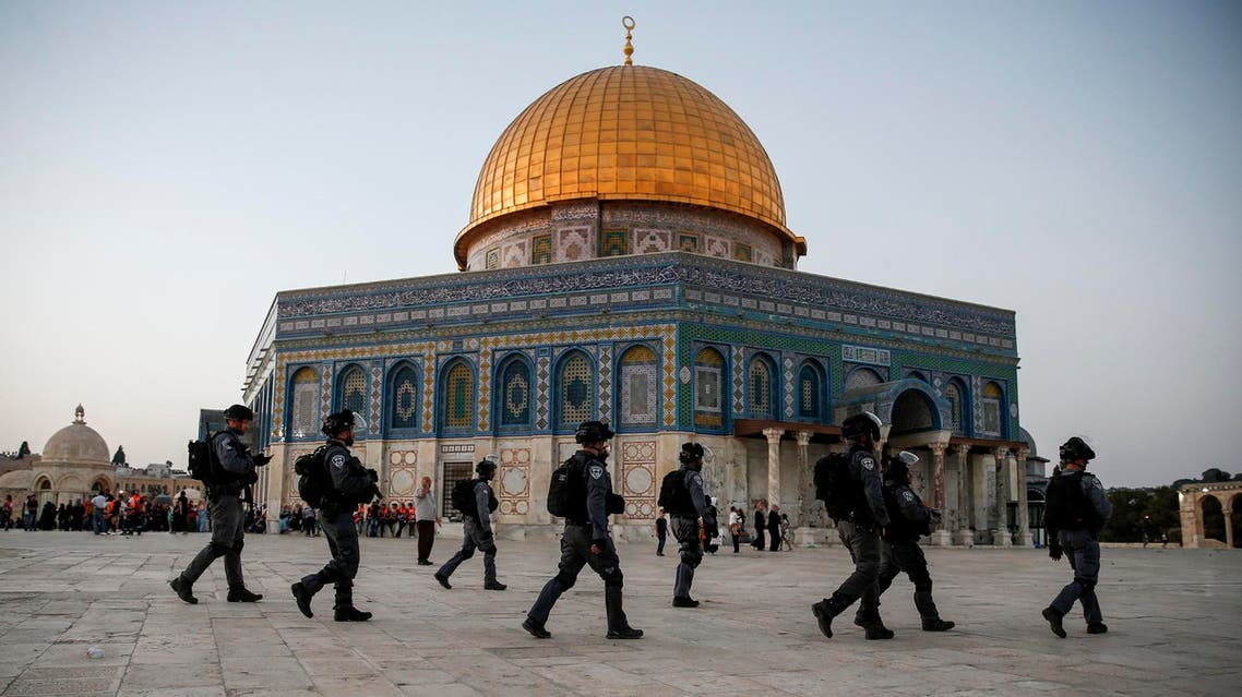 Members of the Israeli security forces walk past the al-Aqsa compound in the Old City of Jerusalem on July 27, 2017. (AFP)