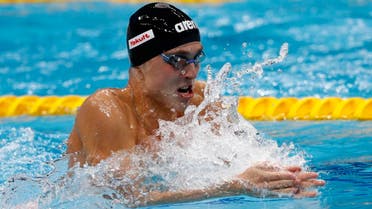Chupkov overhauled his Japanese rivals to claim men's 200m breaststroke gold in two minutes 06.96 seconds. (Reuters)
