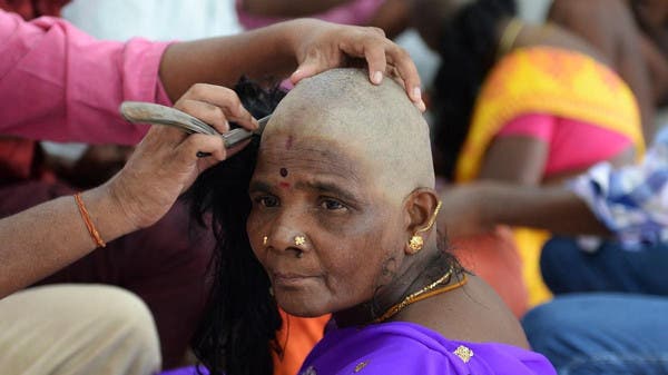 Hair offered to deities in India ends up on thinning heads in Europe,  Africa | Al Arabiya English