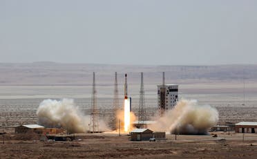 A handout picture released by Iran’s Defense Ministry on July 27, 2017 shows a Simorgh (Phoenix) satellite rocket at its launch site at an undisclosed location in Iran. (AFP)