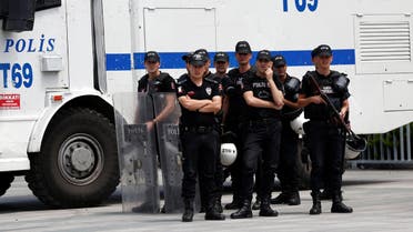 Riot police stand guard during a demonstration in solidarity with the jailed members of the opposition newspaper Cumhuriyet outside a courthouse, in Istanbul, Turkey, July 28, 2017. REUTERS/Murad Sezer