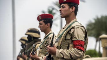 Members of the Egyptian army stand guard outside the venue of a conference for defence ministers and officials of the 27 members of CEN-SAD in Egypt's Red Sea resort of Sharm el-Sheikh on March 24, 2016. AFP