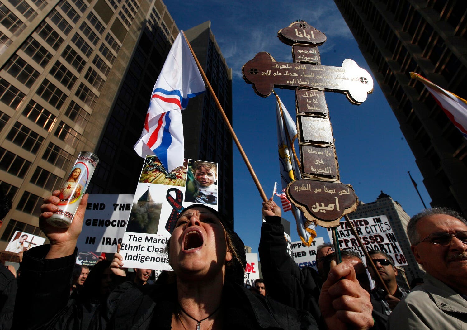Almas Shaya, a member of Michigan’s Chaldean community, who are Iraqi Catholics, rally in Detroit Monday, Nov. 8, 2010. (AP)