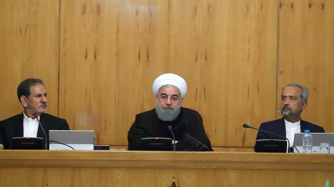 Iranian President Hassan Rouhani and Vice President Eshaq Jahangiri (2nd L) during a cabinet meeting in Tehran on July 26, 2017. (AFP)