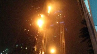 A fire blazes at "The Torch", a residential high-rise tower, in Dubai February 21, 2015. reuters