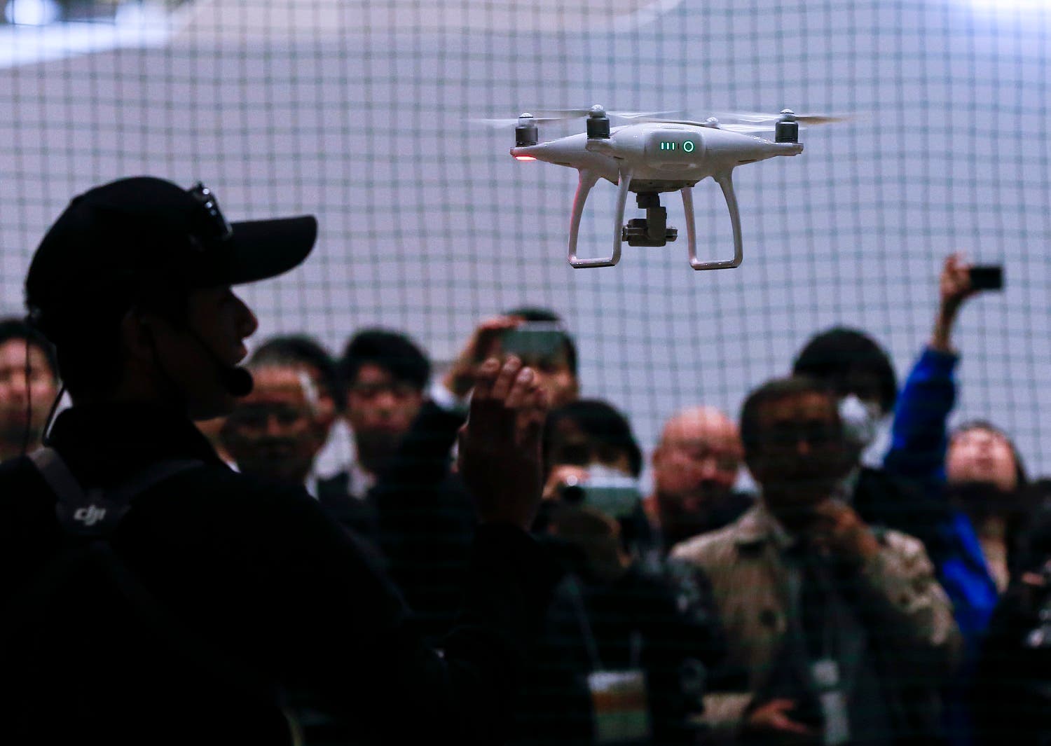 Chinese consumer-drone maker DJI’s Phantom 4 flies during a demonstration at Japan Drone expo in Chiba, near Tokyo. (AP)