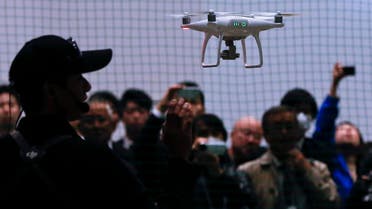 Chinese consumer-drone maker DJI’s Phantom 4 flies during a demonstration at Japan Drone expo in Chiba, near Tokyo. (AP)