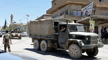 A convoy of Lebanese army soldiers drives at the entrance of the border town of Arsal, in eastern Bekaa Valley, Lebanon June 30, 2017.(Reuters)