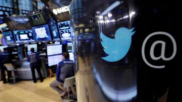 In this file photo, the Twitter logo appears on a phone post on the floor of the New York Stock Exchange. (AP /Richard Drew)