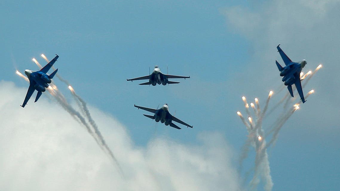 FILE PHOTO: Sukhoi Su-27 jet fighters of the Russkiye Vityazi (Russian Knights) aerobatic team fly in formation during the International Army Games 2016, in Dubrovichi outside Ryazan, Russia, August 5, 2016. REUTERS/Maxim Shemetov/File Photo