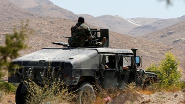 Lebanese army soldiers are seen inside a military vehicle in Labwe, at the entrance of the border town of Arsal, in eastern Bekaa Valley, Lebanon July 24, 2017. REUTERS/Mohamed Azakir