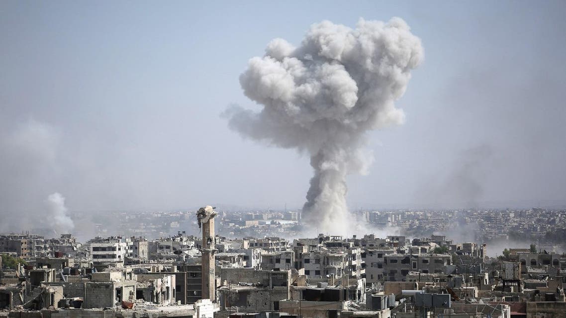 Smoke billows following a reported air strike by Syrian government forces in the rebel-held parts of the Jobar district, on the eastern outskirts of the Syrian capital Damascus, on August 9, 2017. (AFP)