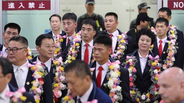 In this June 23, 2017 file photo, North Korean taekwondo demonstration team members and other officials arrive at Gimpo International Airport in Seoul, South Korea. (AP)