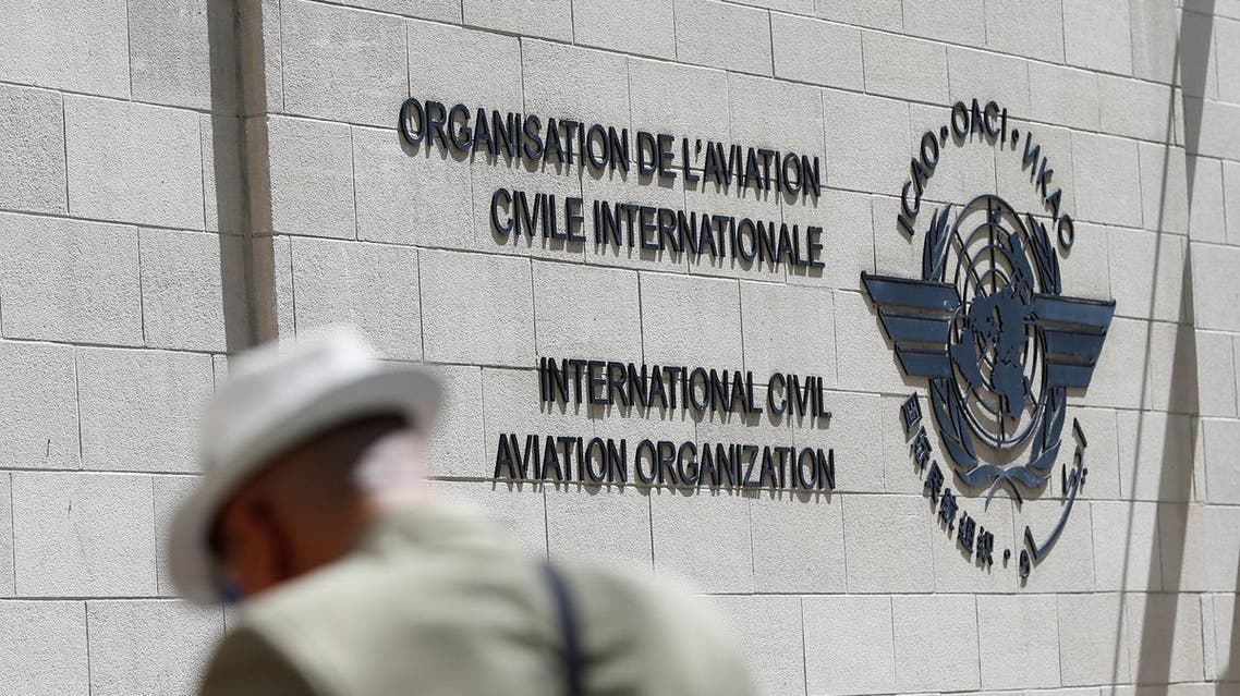 A man eats lunch outside the International Civil Aviation Organization (ICAO) headquarters building is in Montreal, Quebec, Canada June 15, 2017. REUTERS/Christinne Muschi