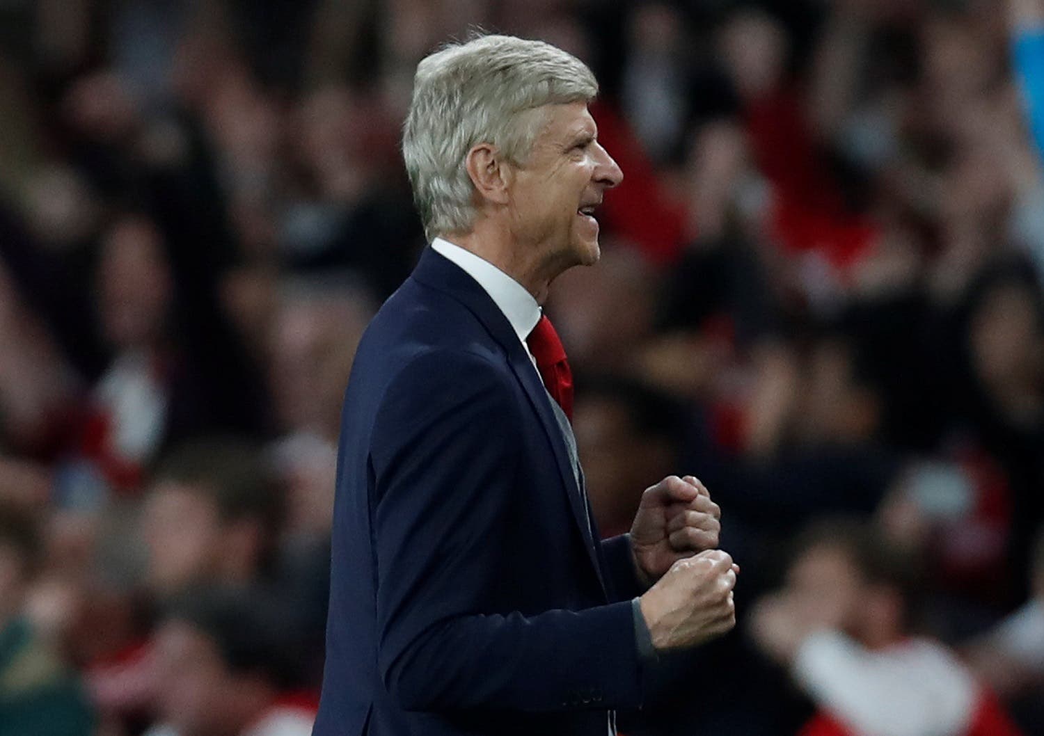 Arsenal manager Arsene Wenger celebrates after the 4-3  win against Leicester City. (Reuters)