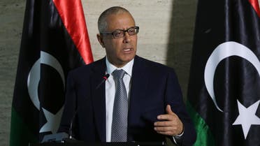 Libya's Prime Minister Ali Zeidan speaks during a press conference on March 8, 2014 in the capital, Tripoli. Libya threatened to bomb a North Korean-flagged tanker at an oil terminal in the restive east if it does not leave, saying it was loading illegally. AFP PHOTO / MAHMUD TURKIA