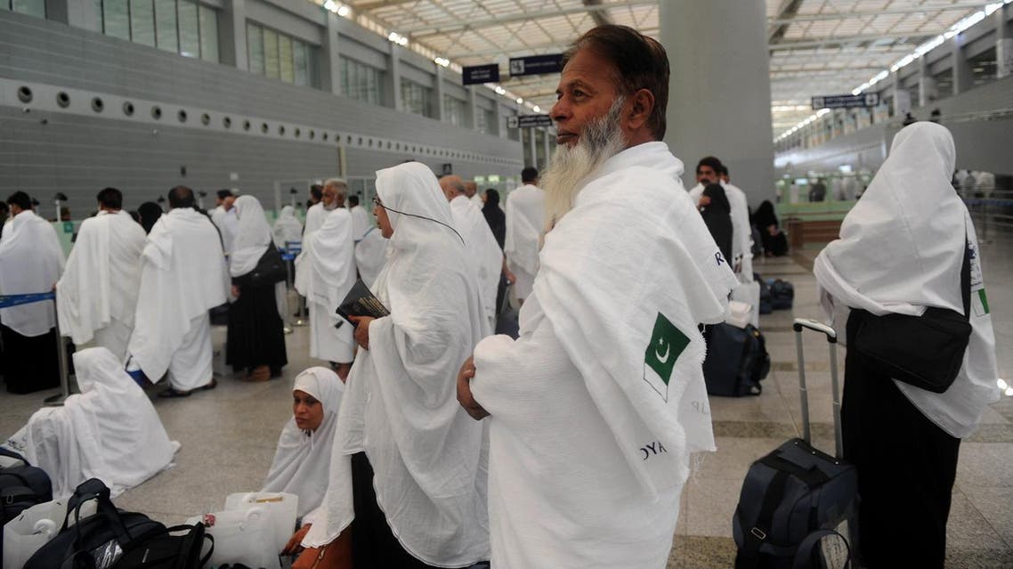 Pakistani Muslims wait to pass security as the first pilgrims for the annual Hajj pilgrimage arrive in Jeddah on July 24, 2017. AFP