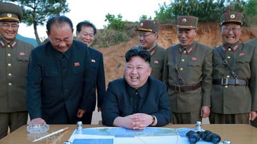 North Korean leader Kim Jong Un reacts during the long-range strategic ballistic rocket Hwasong-12 (Mars-12) test launch. (Reuters)