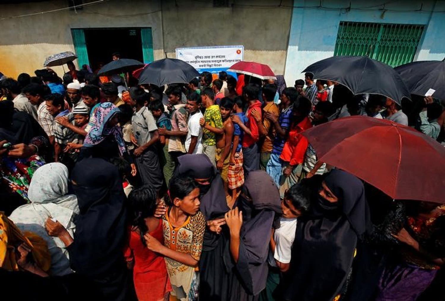 Rohingya refugees congregate for relief supplies from a temporary camp in Cox-Bazar, Bangladesh. (Reuters)