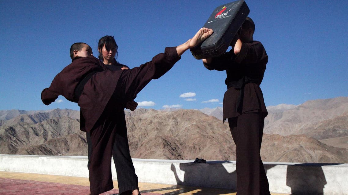 Buddhist nuns help a participant learn Kung Fu during a five-day workshop in Hemis region in Ladakh, India, August 17, 2017. (Reuters)