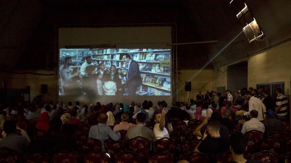Palestinians attend the screening of ‘10 Years’ at Samer Cinema in Gaza City on August 26, 2017. (AFP)