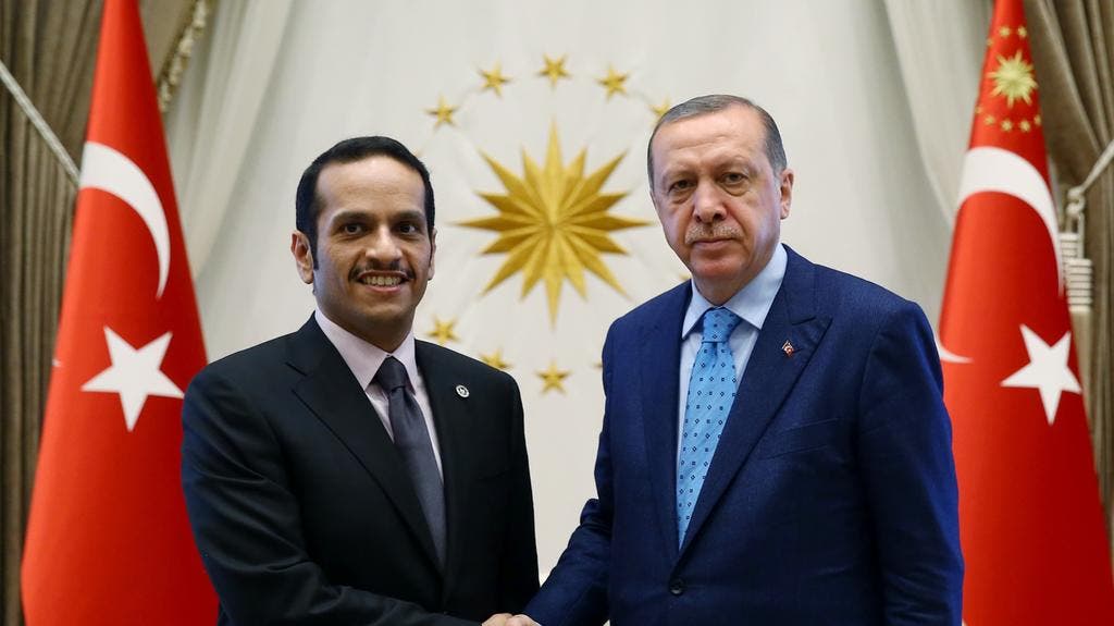 Turkey's President Recep Tayyip Erdogan, right,with Qatar's foreign minister Sheikh Mohammed bin Abdulrahman Al Thani in Ankara, on July 14, 2017. (AP)