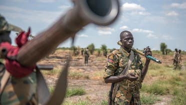 Sudan People Liberation Army (SPLA) soldiers patrol in Alole, northern South Sudan, on October 16, 2016. AFP