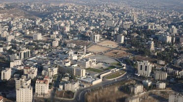 An image take through a helicopter window shows the Mukataa, the headquarters of the Palestinian Authority, on July 19, 2013 in the West Bank city of Ramallah. (AP)