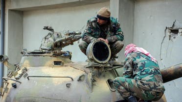       Members of the Syrian government forces sit over the turret of a tank near the town of Qumhanah in the countryside of the central province of Hama, on April 1, 2017. Syrian government forces and allies regained most of the territory they lost earlier during an assault by rebels and jihadists launched on March 21, 2017 in the country's centre, reported the Britain-based Syrian Observatory for Human Rights monitor on March 31, 2017. (AFP)