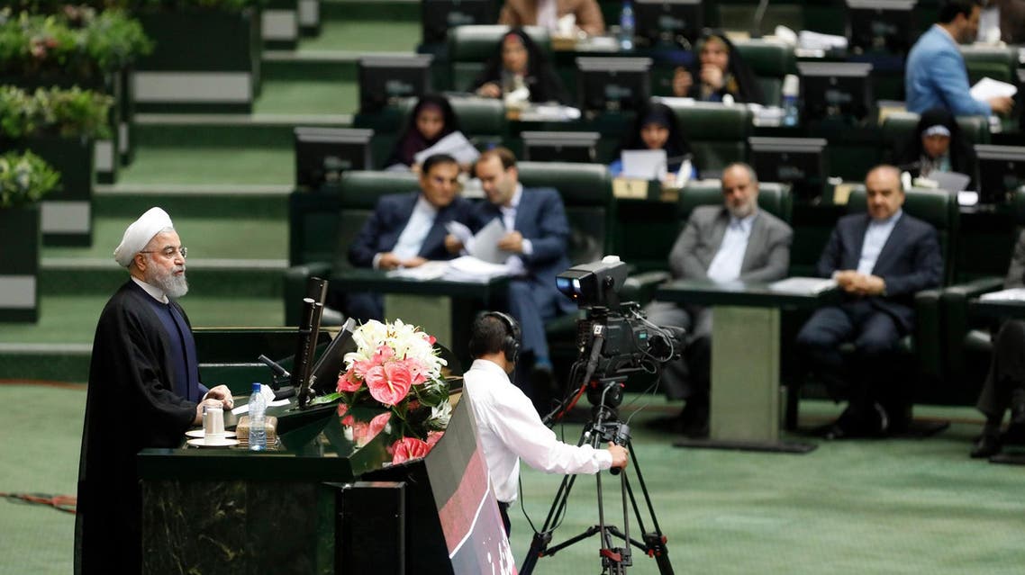 Iranian President Hassan Rouhani delivers a speech to the parliament in Tehran on August 20, 2017, (AFP)