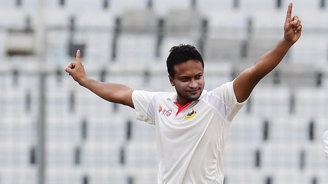 Shakib Al Hasan reacts after the dismissal of Australian cricketer Matt Renshaw during the second day of the first Test cricket match on August 28, 2017. (AFP)