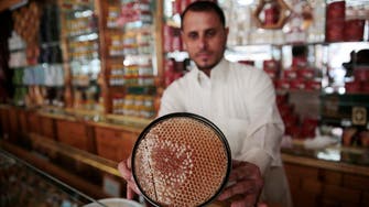 PHOTOS: Yemen’s prized honey industry stung by war