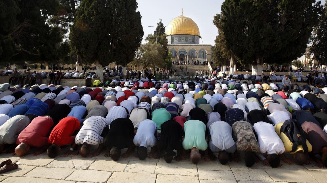 Palestinians pray inside the Al Aqsa Mosque compound in Jerusalem's Old City Thursday, July 27, 2017. (AP)