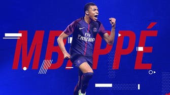 Mbappe signs for PSG on one year loan with option to buy