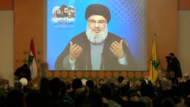 Hezbollah leader Sayyed Hassan Nasralla, who is seen speaking through a video link during a ceremony to honer fallen Hezbollah leaders, in Teir Debba village, south Lebanon, Thursday, Feb. 16, 2017. (AP)