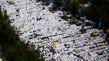 Muslim pilgrims attend noon prayers outside the Namirah mosque on Arafat Mountain, during the annual hajj pilgrimage, outside the holy city of Mecca, Saudi Arabia, Thursday, Aug. 31, 2017. AP