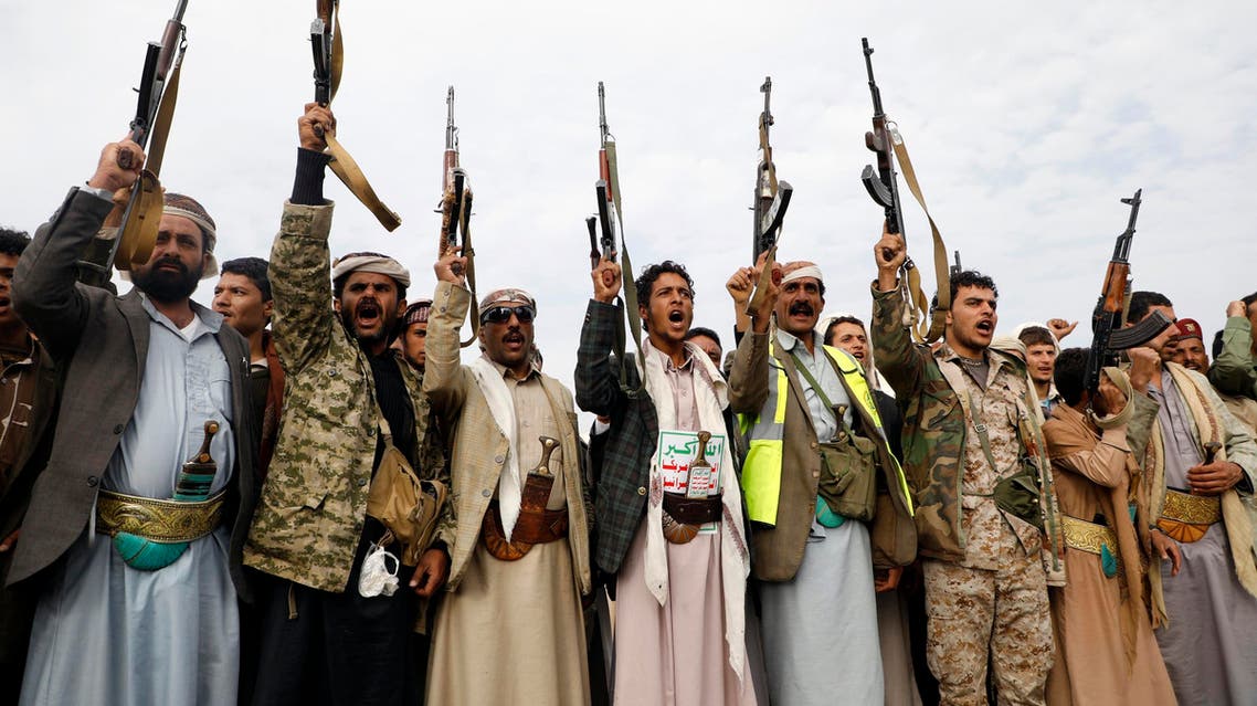 Supporters of the Shiite Huthi movement raise their weapons during a gathering in the capital Sanaa, on August 24, 2017, to mobilize more fighters in the conflict against pro-government forces. (AFP)