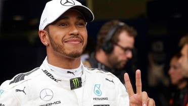 Mercedes driver Lewis Hamilton of Britain celebrates after setting the pole position during the qualifying session for Sunday’s Italian Formula One Grand Prix, at the Monza racetrack. (AP)