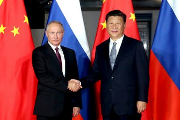 Russian President Vladimir Putin shake hands with Chinese President Xi Jinping during their meeting on the sidelines of the BRICS Summit in Xiamen, on Sept. 3, 2017. (File photo: AP)