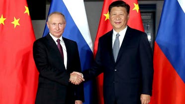 Russian President Vladimir Putin shake hands with Chinese President Xi Jinping during their meeting on the sidelines of the BRICS Summit in Xiamen, on Sept. 3, 2017. (AP)